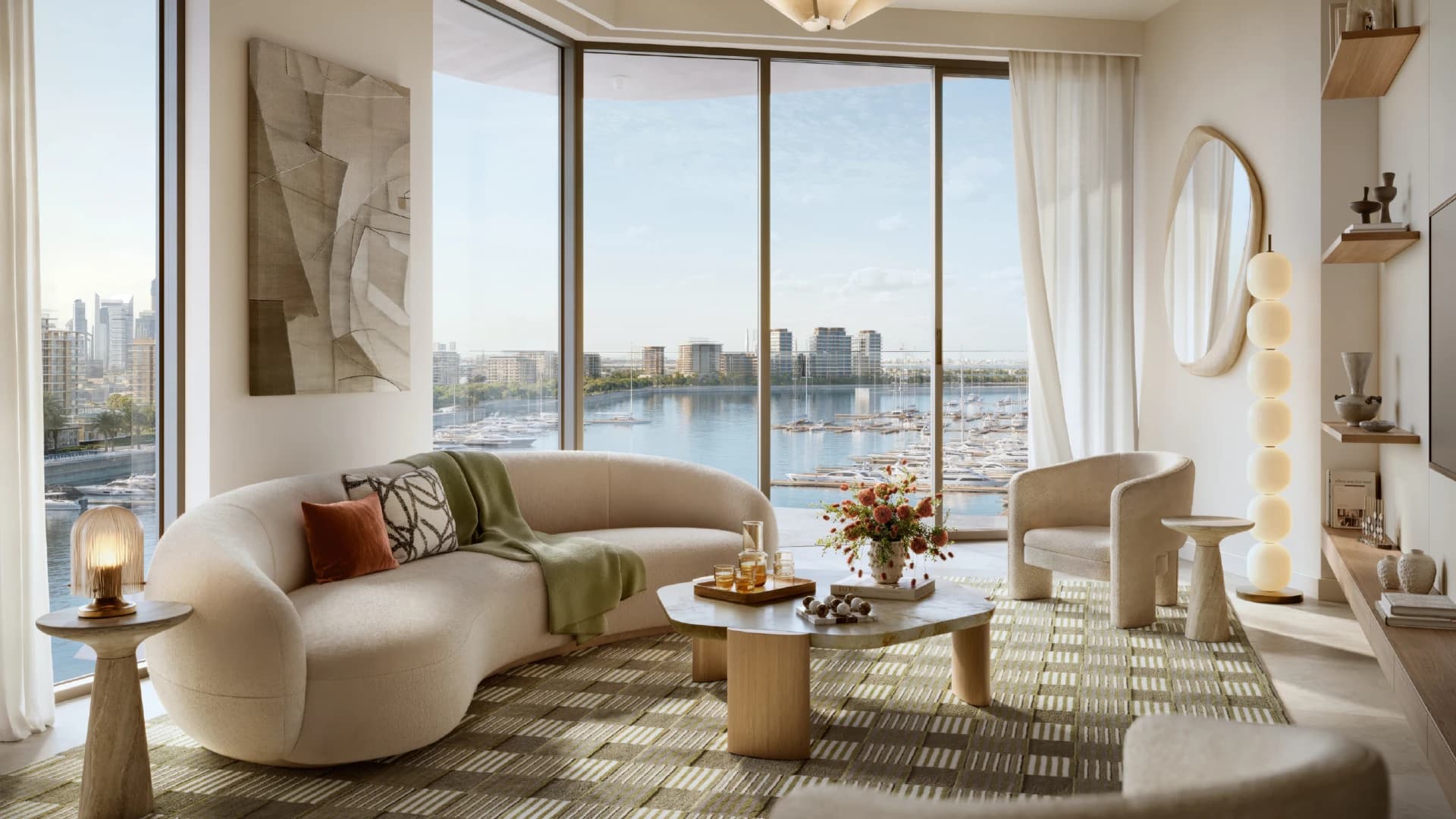 Marina-view living room in a Rashid Yachts & Marina apartment by Emaar, Dubai, with floor-to-ceiling windows overlooking the yacht harbour