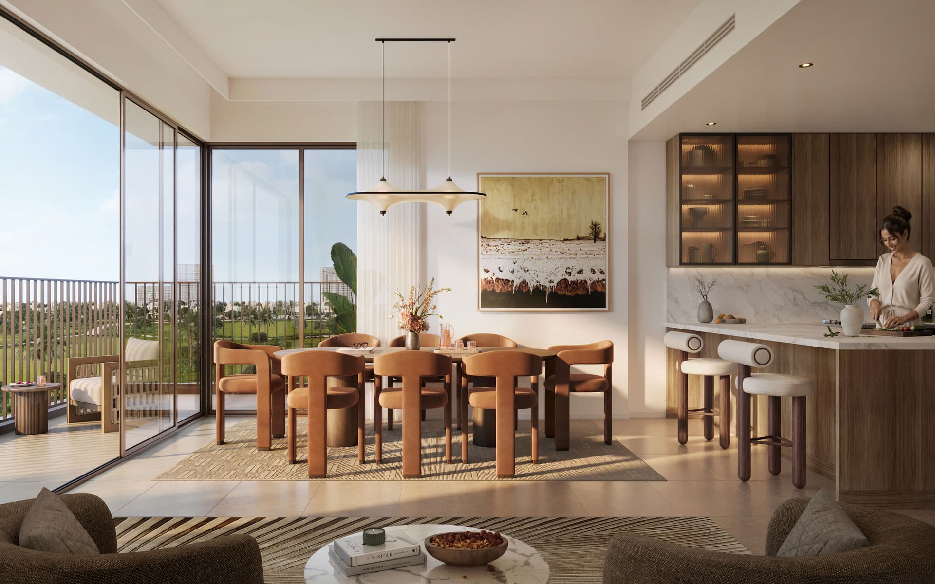 Luxury golf facing apartment interior with open plan dining and kitchen in Dubai
