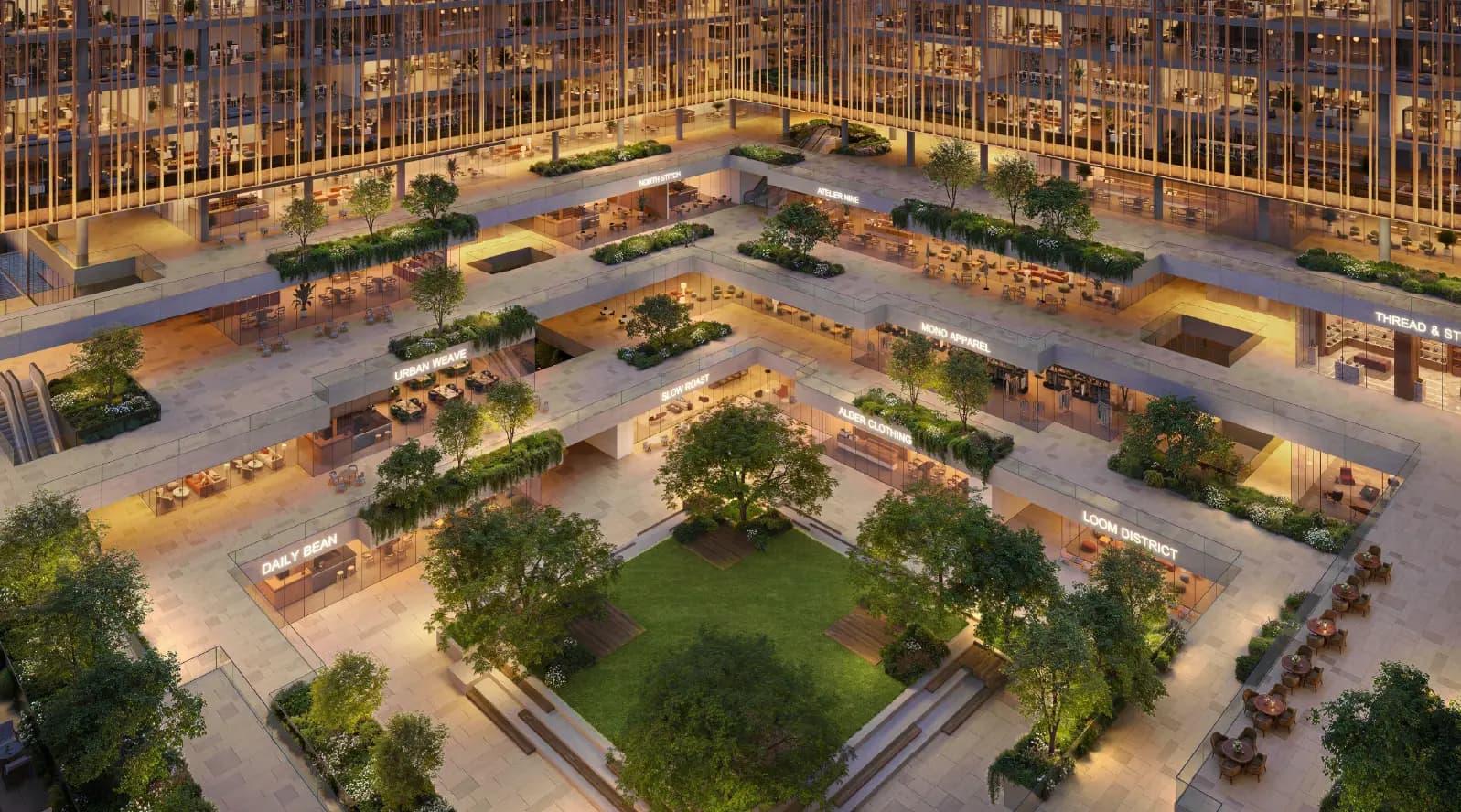 Landscaped courtyard with green spaces and retail outlets in Dubai.