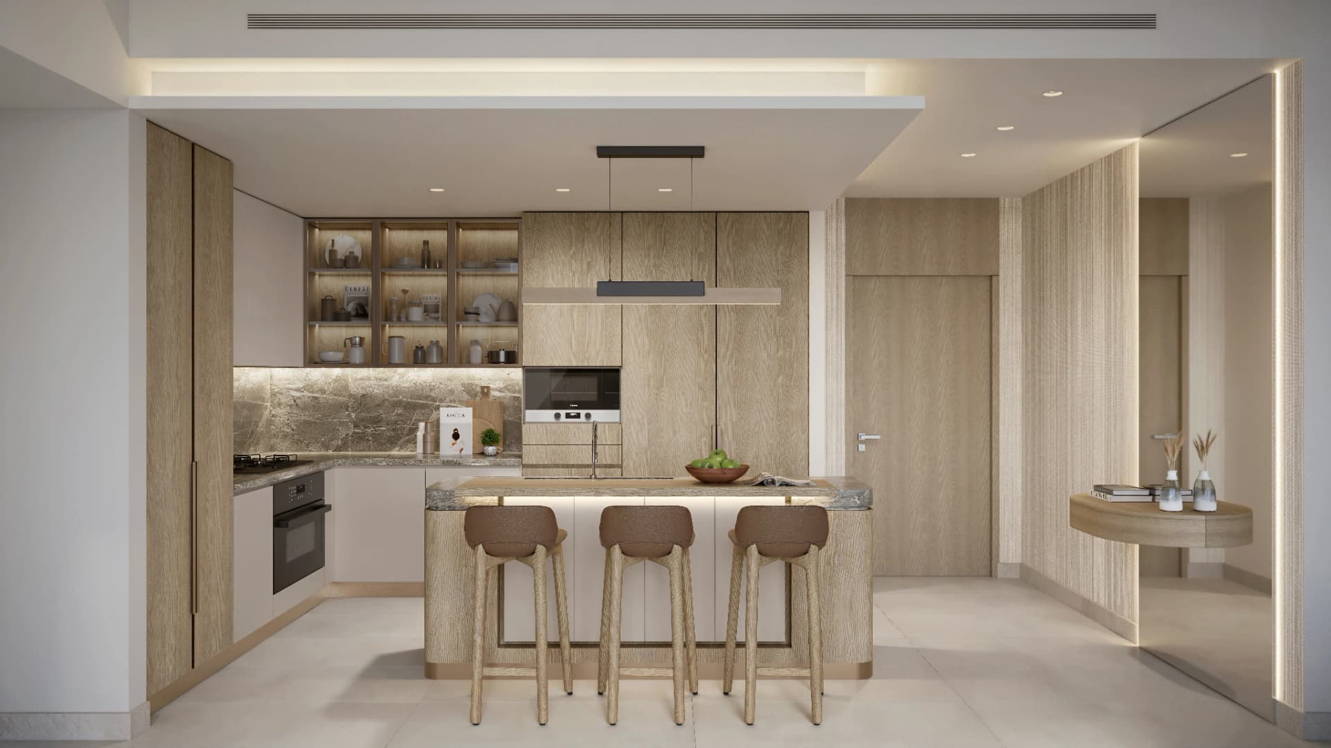 Modern apartment kitchen in MBR City, Dubai, featuring an island, bar seating, and contemporary cabinetry.